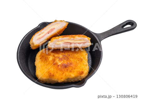 Fried cordon bleu cutlet with cheese and ham in pan isolated on white background. top view 130806419