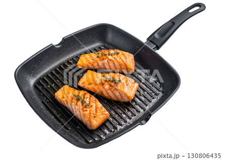 Pan fried salmon fillet steaks with thyme and lemon, fresh fish isolated on white background. top view 130806435