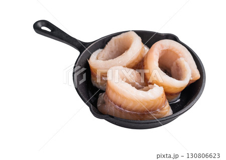 Ready for cooking Raw Pollock fish fillets in pan with herbs isolated on white background. top view 130806623