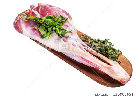 Whole raw lamb leg, uncooked mutton meat on butcher board isolated on white background. top view Whole raw lamb leg, uncooked mutton meat on butcher board isolated on white background. top view 130806651
