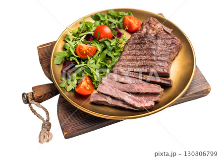 Roast dry aged Top Sirloin beef steak on plate with salad isolated on white background Roast dry aged Top Sirloin beef steak on plate with salad isolated on white background 130806799