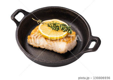Roasted cod fish loin fiilet in skillet isolated on white background 130806936