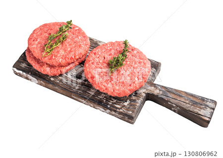 Raw pork and beef meat patties with herbs on wooden board isolated on white background 130806962