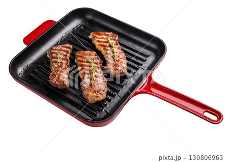 Grilled Tri tip steaks, marbled beef meat on pan with herbs isolated on white background 130806963