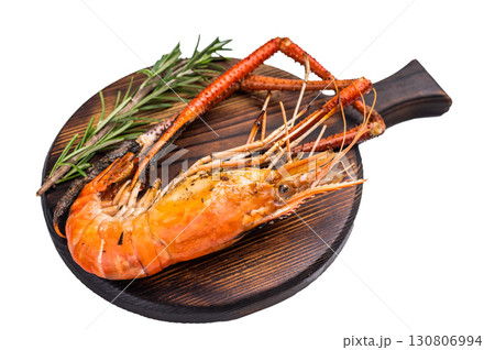 Juicy grilled giant river prawn shrimp served with rosemary, a mouthwatering dish for your next barbecue. isolated on white background. top view 130806994