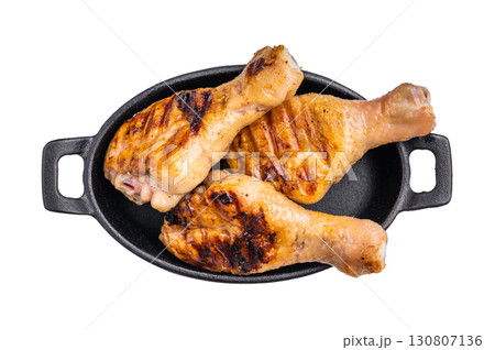 Tender grilled poultry drumsticks, showcasing a smoky aroma and mouthwatering glaze that tempts the taste buds. isolated on white background. top view Tender grilled poultry drumsticks, showcasing a smoky aroma and mouthwatering glaze that tempts the taste buds. isolated on white background. top view 130807136