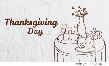 Thanksgiving Day celebration with table setting and floral arrangement 130810706