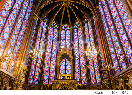 Stained glass windows in Sainte-Chapelle highlight Parisian Gothic architecture 130811047