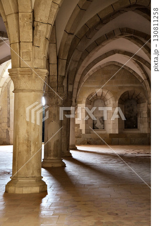Intricate arches and columns of Monastery Santa Maria in Alcobaca, Portugal 130811258