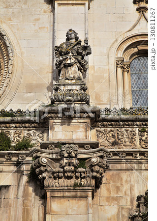 Monumental details of Monastery Santa Maria in Alcobaca, Portugal during a sunny day Monumental details of Monastery Santa Maria in Alcobaca, Portugal during a sunny day 130811267