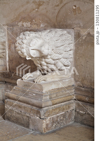Batalha, Portugal - April 02, 2017 - Batalha Monastery showcases intricate lion sculptures 130811295