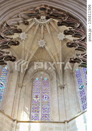 Intricate Gothic architecture of Batalha Monastery in Portugal showcasing unique detail Intricate Gothic architecture of Batalha Monastery in Portugal showcasing unique detail 130811306