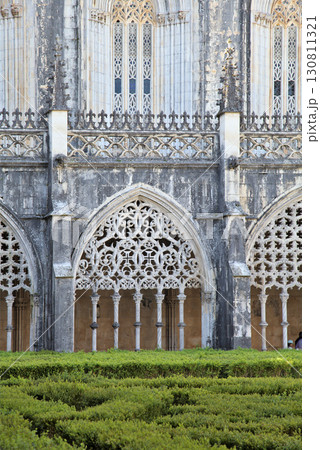 Gothic architecture and manicured gardens at Batalha Monastery in Portugal 130811321