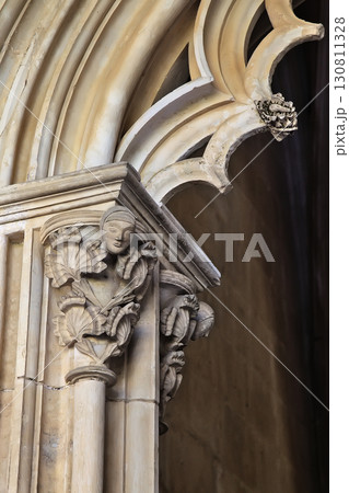 Detail of stone sculpture on column at Batalha Monastery in Portugal Detail of stone sculpture on column at Batalha Monastery in Portugal 130811328