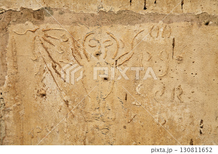 Unique historical carvings on the wall of Batalha monastery in Portugal 130811652