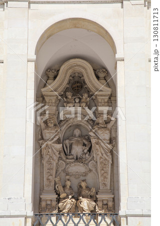 Coimbra, Portugal - April 3, 2017 - Sao Miguel Chapel in Coimbra University features intricate statues Coimbra, Portugal - April 3, 2017 - Sao Miguel Chapel in Coimbra University features intricate statues 130811713