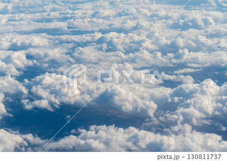 Clouds and blue sky, view from airplane Clouds and blue sky, view from airplane 130811737