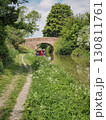 Canal boat and bridge on Kennet and Avon Canal, Stanton St Bernard, Wiltshire Canal boat and bridge on Kennet and Avon Canal, Stanton St Bernard, Wiltshire 130811761