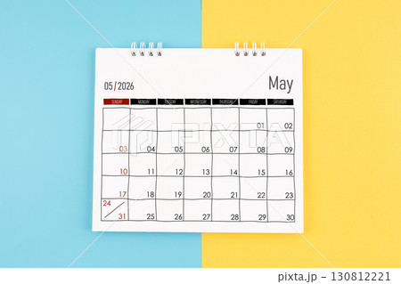 May 2026 calendar on blue and yellow color background, Flat lay. May 2026 calendar on blue and yellow color background, Flat lay. 130812221