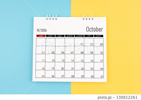 October 2026 calendar on blue and yellow color background, Flat lay. 130812261