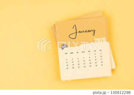 January 2026 calendar card on yellow color background with copy space. January 2026 calendar card on yellow color background with copy space. 130812296