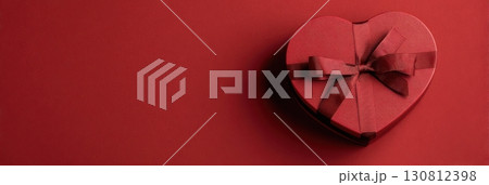 Happy Valentines day template with gift box. Romantic design decorative objects, red heart. Sale long banner, surprise poster, flyer and brochure. Mock up holiday. Front view. 3D. Panoramic Happy Valentines day template with gift box. Romantic design decorative objects, red heart. Sale long banner, surprise poster, flyer and brochure. Mock up holiday. Front view. 3D. Panoramic 130812398