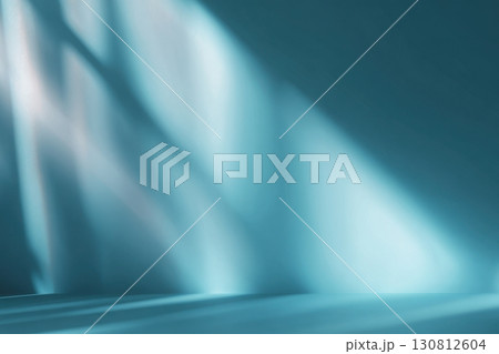 Minimal abstract background, light and shadow of tree leaves. Cosmetic product presentation. Premium podium. Pastel blue wall. Showcase display. Front view. Mockup ad. Turquoise jeans color 3d case. 130812604