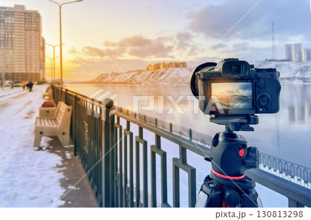 Landscape and urban street photography. A camera on a tripod captures the perspective of the city streets and the river embankment. Lessons and courses in landscape and urban photography. 130813298