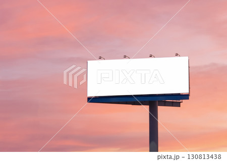 An empty mockup banner for advertising and design against a colorful sunset sky. A wonderful mockup background for a design presentation. 130813438