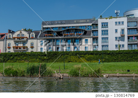Poland, Krakow, View of the Niebieski Art Hotel from the Vistula River Poland, Krakow, View of the Niebieski Art Hotel from the Vistula River 130814769