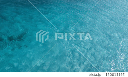 Serene turquoise sea, gentle ripples, crystalline waters. Evokes tranquility, ideal for travel, relaxation, or environmental themes. Use for backgrounds  more. 130815165
