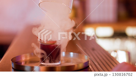 Cold smoke liquor. Alcoholic beverage. Fragrant drink served on metal bar tray. Professional equipment for cocktail technique preparation. Cold smoke liquor. Alcoholic beverage. Fragrant drink served on metal bar tray. Professional equipment for cocktail technique preparation. 130816702