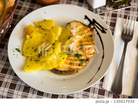 Grilled steak of shark with green sauce Grilled steak of shark with green sauce 130817038