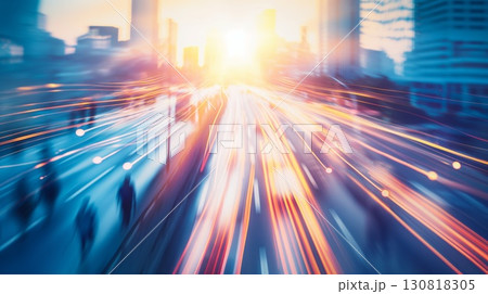 Long exposure city street sunset blurred vehicle pedestrian light trails modern urban landscape 130818305