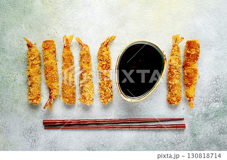 Fried shrimp, peeled in tempura, soy sauce, close-up, 130818714