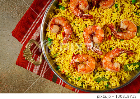 rice with saffron and shrimp, in a frying pan, paella with shrimp, top view, homemade, no people, 130818715