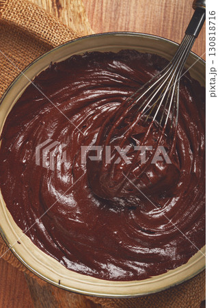 a bowl of chocolate dough, a whisk for whipping, baking, structure and consistency, homemade, top view, no people, a bowl of chocolate dough, a whisk for whipping, baking, structure and consistency, homemade, top view, no people, 130818716