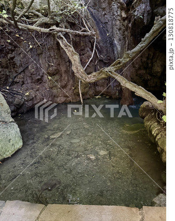 Natural spring water source in tropical forest. A place in Cyprus in Paphos where the goddess Aphrodite bathed in ancient times. 130818775