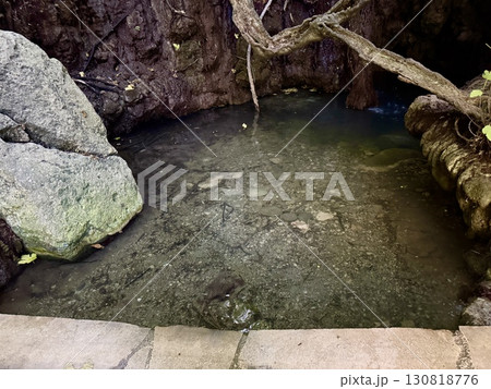 Natural spring water source in tropical forest. A place in Cyprus in Paphos where the goddess Aphrodite bathed in ancient times. 130818776