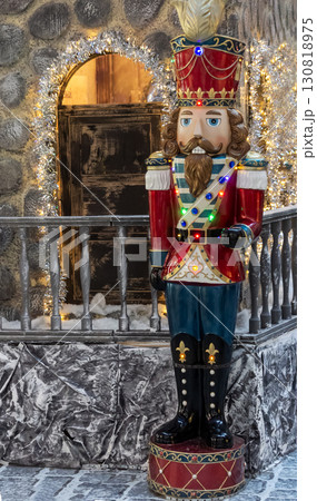 The Nutcracker on the New Year's Tree in Minsk. Beautiful Christmas background. The Nutcracker on the New Year's Tree in Minsk. Beautiful Christmas background. 130818975