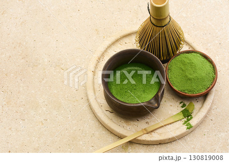Ceremonial Matcha Preparation. Ceremonial matcha with bamboo whisk, bowl Ceremonial Matcha Preparation. Ceremonial matcha with bamboo whisk, bowl 130819008
