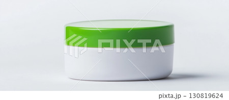 Face cream jar. Mockup of white cosmetic jar with green lid isolated on a white background. Copy space. Beauty product branding template. Plastic container skincare medicals, lotion bottle. Body care Face cream jar. Mockup of white cosmetic jar with green lid isolated on a white background. Copy space. Beauty product branding template. Plastic container skincare medicals, lotion bottle. Body care 130819624