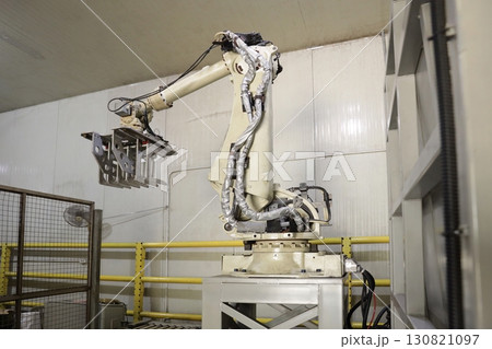 Robotic Arms at Modern Factory. 130821097