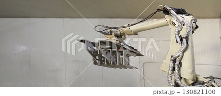 Robotic Arms at Modern Factory. Robotic Arms at Modern Factory. 130821100