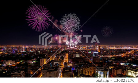 New Year's Eve Fireworks Over City Skyline at Night New Year's Eve Fireworks Over City Skyline at Night 130825176