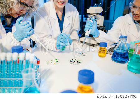 Scientist team with tablet and laptop, laboratory and ecofriendly science. Agriculture, research and scientists 130825780