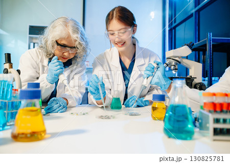 Scientist team with tablet and laptop, laboratory and ecofriendly science. Agriculture, research and scientists 130825781