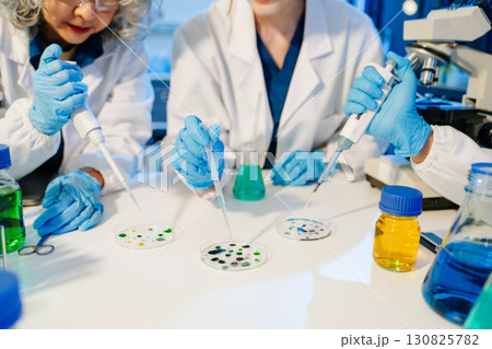 Scientist team with tablet and laptop, laboratory and ecofriendly science. Agriculture, research and scientists 130825782