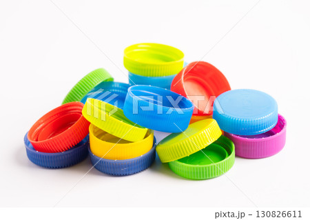 Plastic bottle colored screw caps for recycle waste on white background, container water lid. 130826611