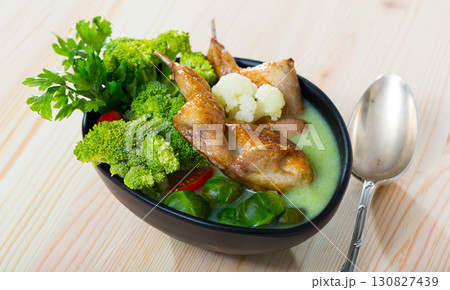 Cabbage soup with quails and greens 130827439